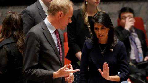 Nikki Haley (R) speaks with Britain"s Ambassador to the United Nations Matthew Rycroft before a UN Security Council emergency meeting over North Korea"s latest missile launch, 4 September, at UN Headquarters in New York