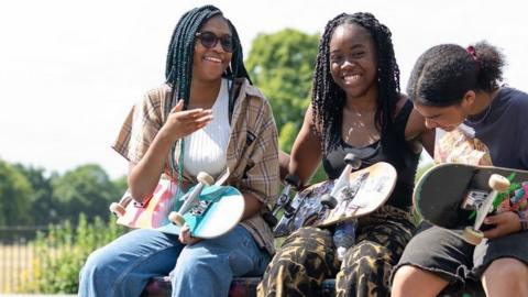 Girls skateboarding