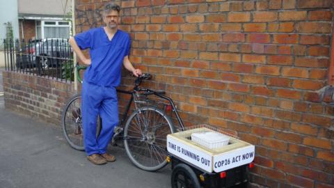 Jet McDonald with his bike and ice block