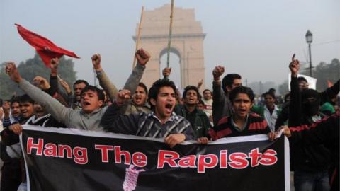 Indian demonstrators shout slogans during a protest calling for better safety for women following the rape of a student last week, in front the India Gate monument in New Delhi on December 23, 2012.