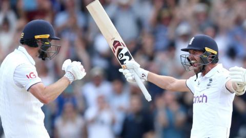 Chris Woakes and Mark Wood celebrate at Headingley