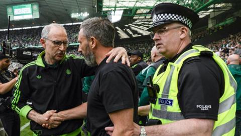Celtic manager Martin O'Neill, Hearts counterpart and a police officer