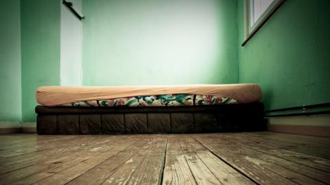 Mattress on bedroom floor