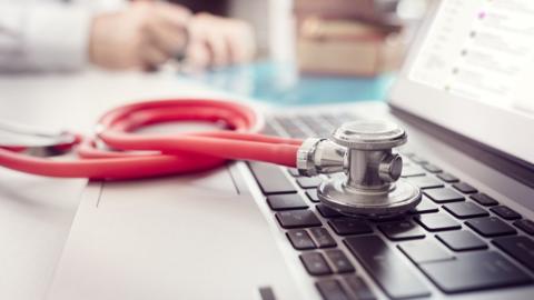 Stethoscope on a laptop