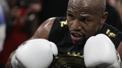 In this file photo taken on August 10, 2017 Boxer Floyd Mayweather Jr. goes through moves during a media workout at the Mayweather Boxing Club in Las Vegas, Nevada