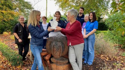 Michaela hands bees project award