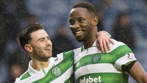 Celtic's Patrick Roberts and Moussa Dembele celebrate at Ibrox