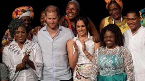 Prince Harry and Meghan (centre) poses with Colombia's Vice-President Francia Márquez (right) and others on stage at an event celebrating Afro-Colombian women, in Cali, Colombia August 18, 2024.