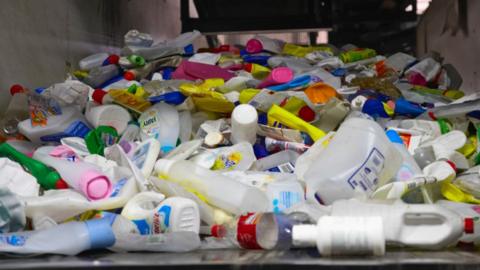 Plastic bottles on a conveyor belt