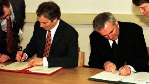 Prime Minister Tony Blair and Irish counterpart sign the Good Friday Agreement