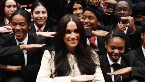 Meghan with pupils from Robert Clack School of Science