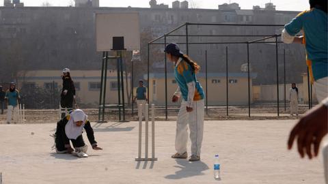 Afghan girls play cricket in school