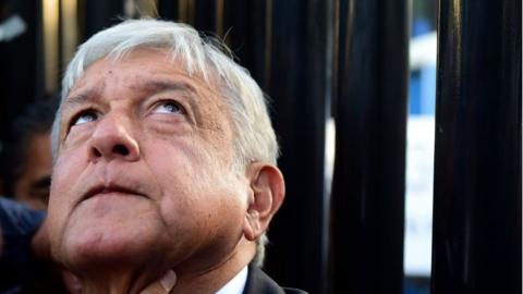 Mexico"s presidential candidate Andres Manuel Lopez Obrador for the "Juntos haremos historia" party, gestures before voting during general elections, in Mexico City, on July 1, 2018.