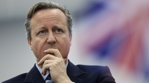 Foreign Secretary David Cameron visits NATO troops at the Film City base during a visit to Kosovo in January