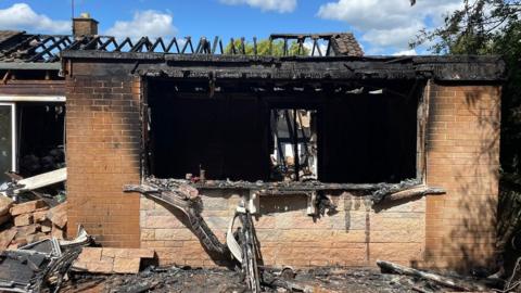 Fire damage to bungalow on The Crescent, Woodthorpe