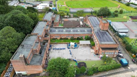 An aerial view of a H-shaped primary school