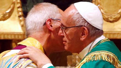Pope Francis embraces the Archbishop of Canterbury