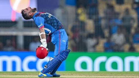 Afghanistan's captain Hashmatullah Shahidi celebrates after winning the 2023 ICC Men's Cricket World Cup one-day international (ODI) match between Pakistan and Afghanistan at the MA Chidambaram Stadium in Chennai on October 23, 2023.