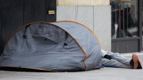 Homeless person in a tent