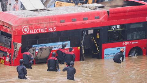 Rescue workers spent days dislodging vehicles trapped in the flooded underpass