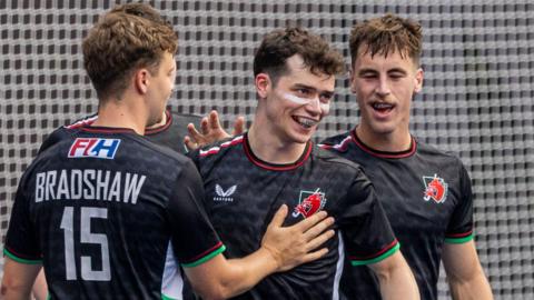 Jolyon Morgan (centre) celebrates