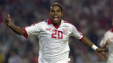 Jose Clayton celebrates a goal for Tunisia in 2006