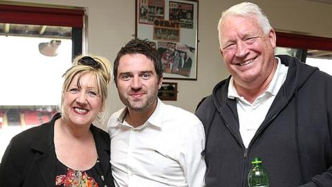 George Gilbey with his mother Linda Gilbey and stepfather Pete McGarry