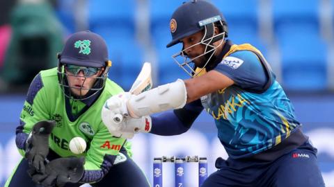 Ireland's Lorcan Tucker keeps wicket as Sri Lanka's Kusal Mendis attempts a cut shot in the T20 World Cup match in Hobart last October