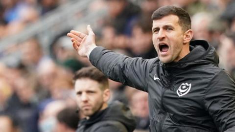 Portsmouth head coach John Mousinho says their playoff hopes are still 'alive' following their win over Forest Green.