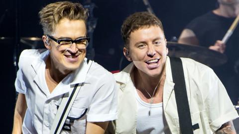 Tom Fletcher (L) and Danny Jones of McFly perform at The O2 Arena on November 21, 2021 in London, England