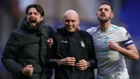 Will Smallbone (centre) celebrates a Southampton victory with boss Russell Martin