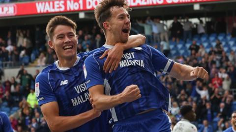 Ryan Wintle (right) celebrates his goal with Rubin Colwill