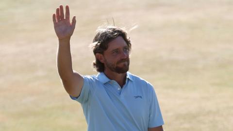 Tommy Fleetwood waves to the crowd at Royal Birkdale