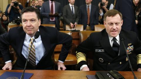 FBI Director James Comey (L) and National Security Agency Director Mike Rogers