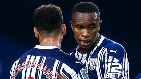 West Brom's players celebrate scoring against Harrogate Town in the Carabao Cup