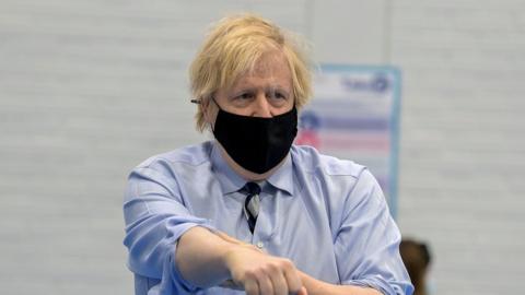 Boris Johnson visiting a vaccination centre in Northern Ireland in March