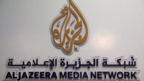 The logo of Al Jazeera Media Network is seen during the annual MIPCOM television programme market in Cannes, France, October 17, 2016