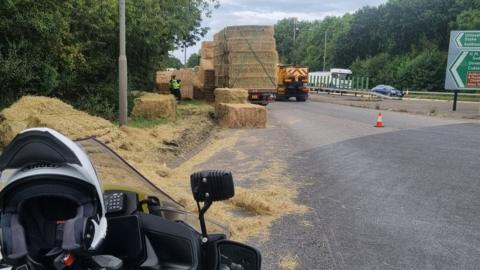 Hay bales fall off lorry on A50, in Aston-on-Trent, Derbyshire