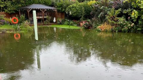 Garden submerged with flood water