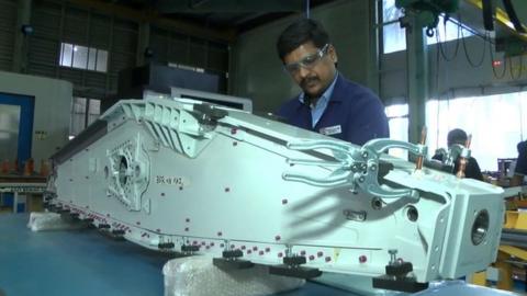 Worker in aviation factory