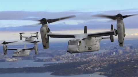 Three Osprey aircraft flying in formation above the Pacific Ocean off the coast of Sydney, Australia, on 29 June