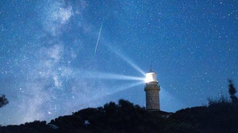 A meteor streaks in the night sky during the annual Perseid meteor shower on the island of Lastovo, Croatia