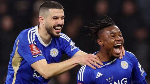 Abdul Fatawu of Leicester celebrates with Conor Coady after scoring in extra time against Bournemouth in the FA Cup fifth round