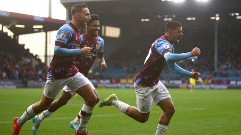 Anass Zaroury celebrates scoring