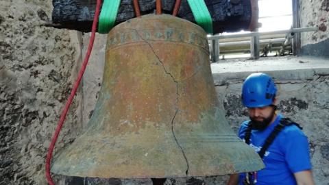 Bell being removed
