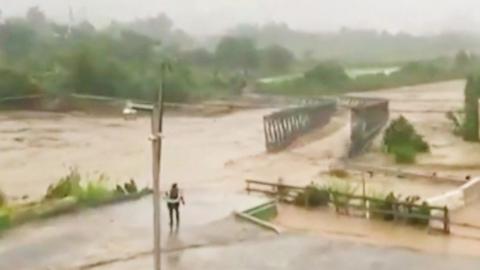 Puerto Rican bridge destroyed by flood water