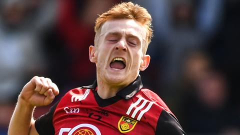 Liam Kerr celebrates after scoring Down's first-half goal