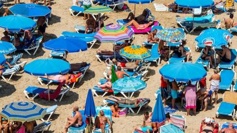 Tourists on a beach