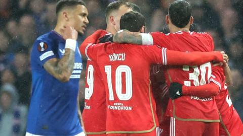 Rangers James Tavernier as Benfica celebrate