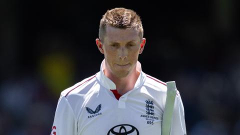 England opener Zak Crawley looks dejected as he walks off after being dismissed